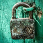 Rusty Padlock On Blue Door ALT